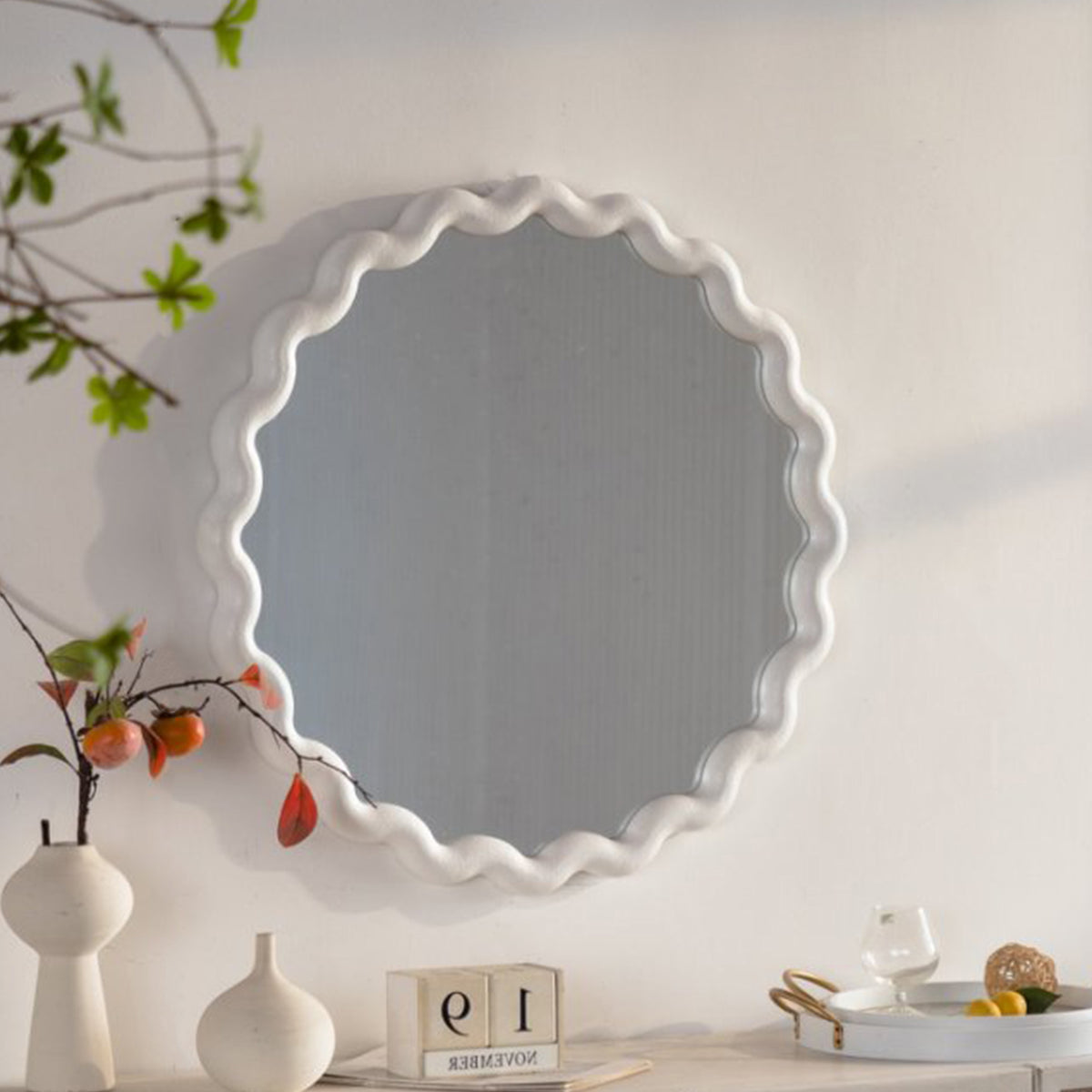 Scalloped round wall mirror with cream white frame