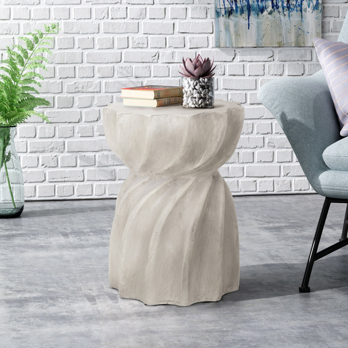 Sculptural hourglass side table in stone grey